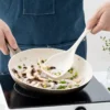 S1b1b5cd80e7a4f0ca850c86aa77eb1ddj.webp Two-in-one Silicone Spatula and Spoon High-temperature Resistant and Non-stick Specially Designed with Scale for Stir-frying